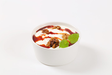 yogurt with walnuts and chocolate topping