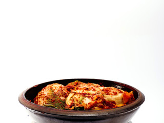 Kimchi in the crock bowl isolated