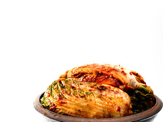 Kimchi in the crock bowl isolated