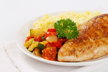turkey breast fillet with potato puree and vegetables