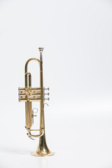 Gold lacquer trumpet with mouthpiece isolated on white