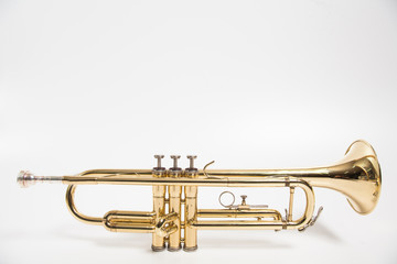 Fototapeta na wymiar Gold lacquer trumpet with mouthpiece isolated on white