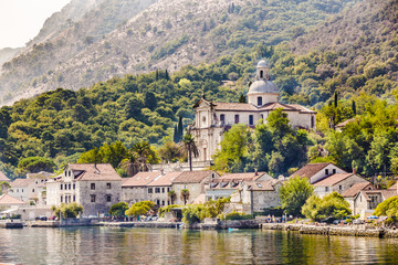 Fototapeta na wymiar view from the sea to the church of the birth of the Virgin
