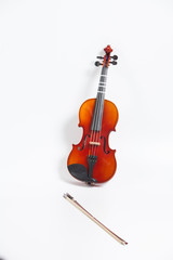 Naklejka na ściany i meble Violin with bow isolated on white 