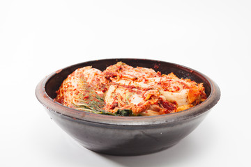 Kimchi on a crock head dish isolated