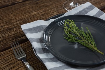 Elegance table setting on wooden plank