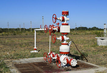 Well for oil and gas production. Oil well wellhead equipment. Oil production