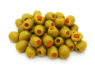 bunch of stuffed green olives on a white background