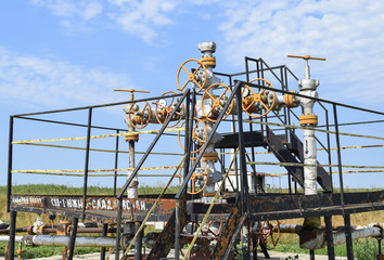 Well for oil and gas production. Oil well wellhead equipment. Oil production. Wells in the Kuban. Extraction of hydrocarbons.