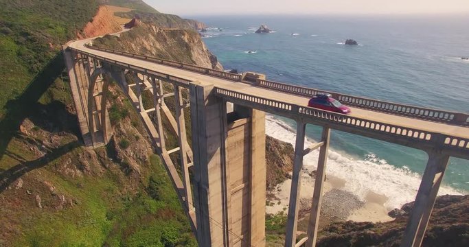 Camera ascending over Bixby Creek Bridge on PCH Highway 1