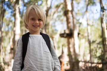 Fototapeta premium Portrait of little girl in the forest