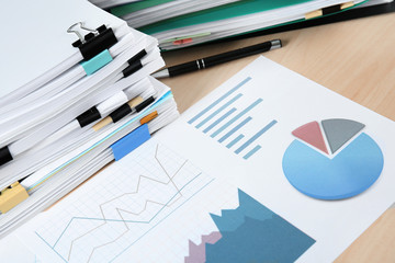 Stack of documents on table