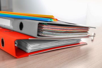 Stack of documents on table