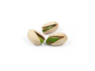 Roasted and salted pistachios isolated on white backround