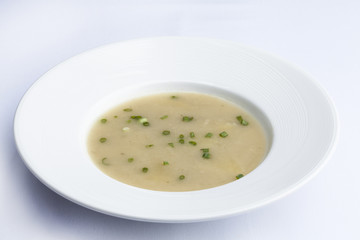 Parsnip cream soup on White floor