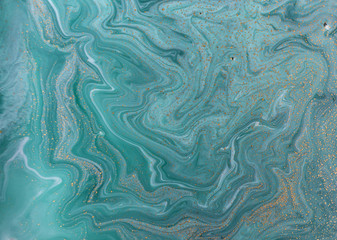 Fototapeta na wymiar Marble abstract acrylic background. Nature green marbling artwork texture. Golden glitter.