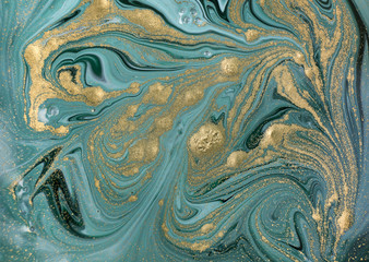 Marble abstract acrylic background. Nature green marbling artwork texture. Golden glitter.