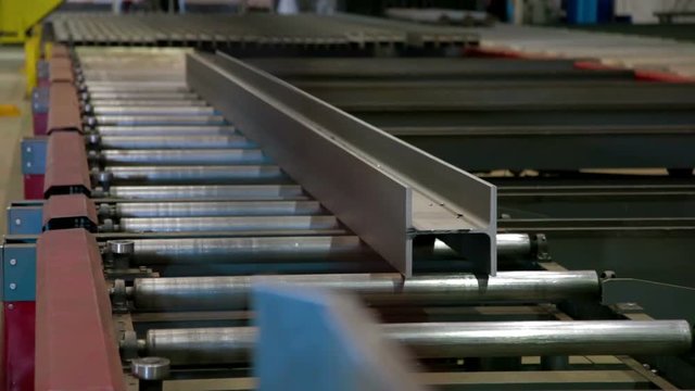 Conveyor of Automated machine cuting metal in Industrial factory
