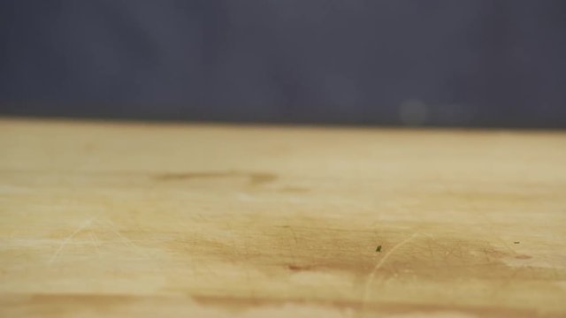Crushing garlic with the kitchen knife