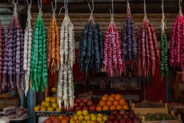 Churchkhela is a traditional Georgian candle-shaped candy. The main ingredients are grape must, nuts and flour dipped in thickened grape juice or fruit juices and dried in the shape of a sausage.