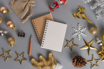 Christmas holiday background with gold ornaments and decorations. Merry christmas and happy new year greeting card with copy space. Christmas celebration holiday background.