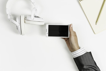 Businesswoman using her smartphone