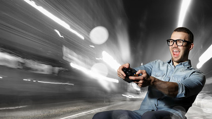 Gamer guy with joystick © Sergey Nivens