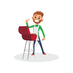 Fototapeta premium Happy bearded man character in apron showing thumb up and cooking a barbecue grill. Vector flat cartoon illustration isolated on white background.