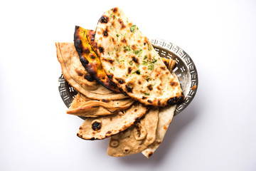 Assorted Indian Bread Basket includes chapati, tandoori roti or naan, paratha, kulcha, fulka, missi roti
