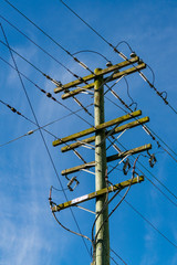 telegraph pole with blue sky