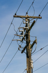 telegraph pole with blue sky