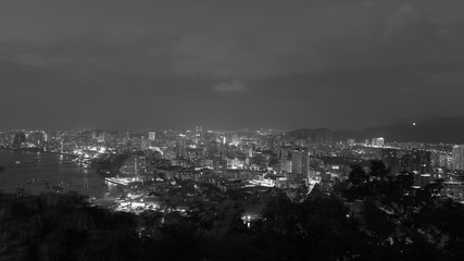 Evening center of Sanya city and the sea shore on the island of Hainan - black and white