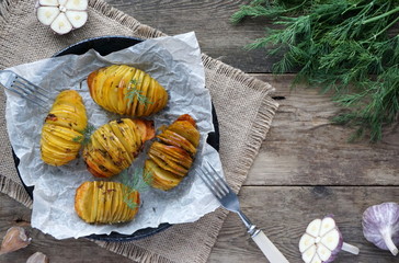 Baked potatoes with garlic and dill