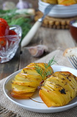Baked potatoes with garlic and dill