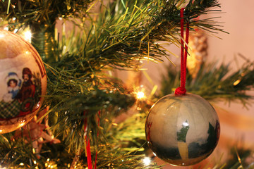 New Year's toys on the Christmas tree. Christmas. New Year. Celebration. Card	