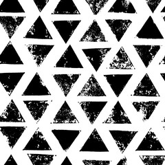 Black and white triangles aged geometric ethnic grunge seamless pattern, vector