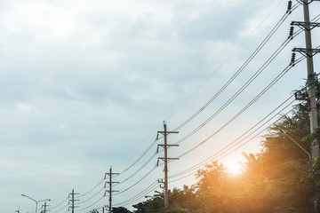 Electricity concept. Close up high voltage power lines station.