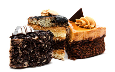Delicious chocolate cakes pastry with peanut and cream isolated