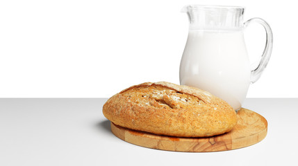 Bread and milk on the table