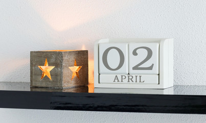 White block calendar present date 3 and month April