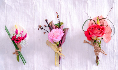 corsage of flowers isolated on white background © sutsaiy