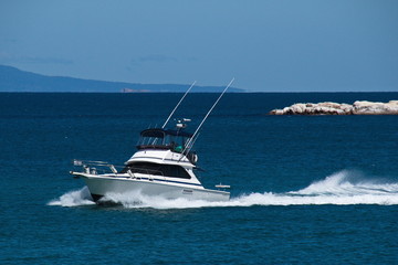 Motor boat in Hazards Bay in Freycinet NP in Tasmania
