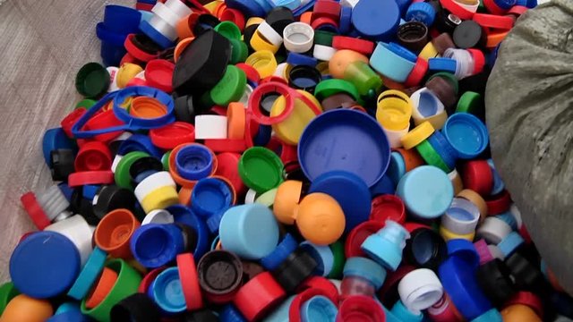 Plastic lids from bottles prepared for recycling