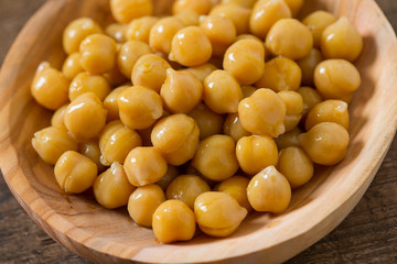 chickpeas on wooden surface