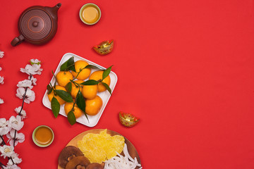 Conceptual flat lay Chinese New Year food and drink still life.