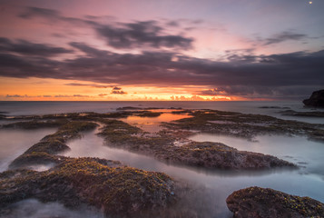 Sunset at mangening beach, bali,, indonesia