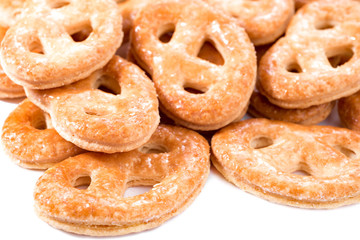 cookies stack closeup. Krakelingen  isolated on a white background