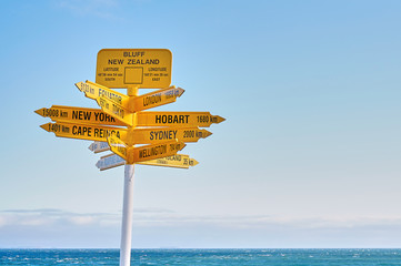 Signpost in the Stirling Point, Bluff, New Zealand. Most southern mainland point of New Zealand. Copy space