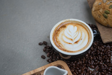 Morning coffee,Latte coffee in cup on table,vintage tone.