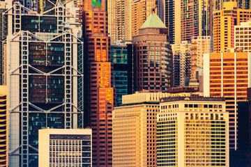 Obraz premium Close view of Hong Kong skyscrapers at sunset